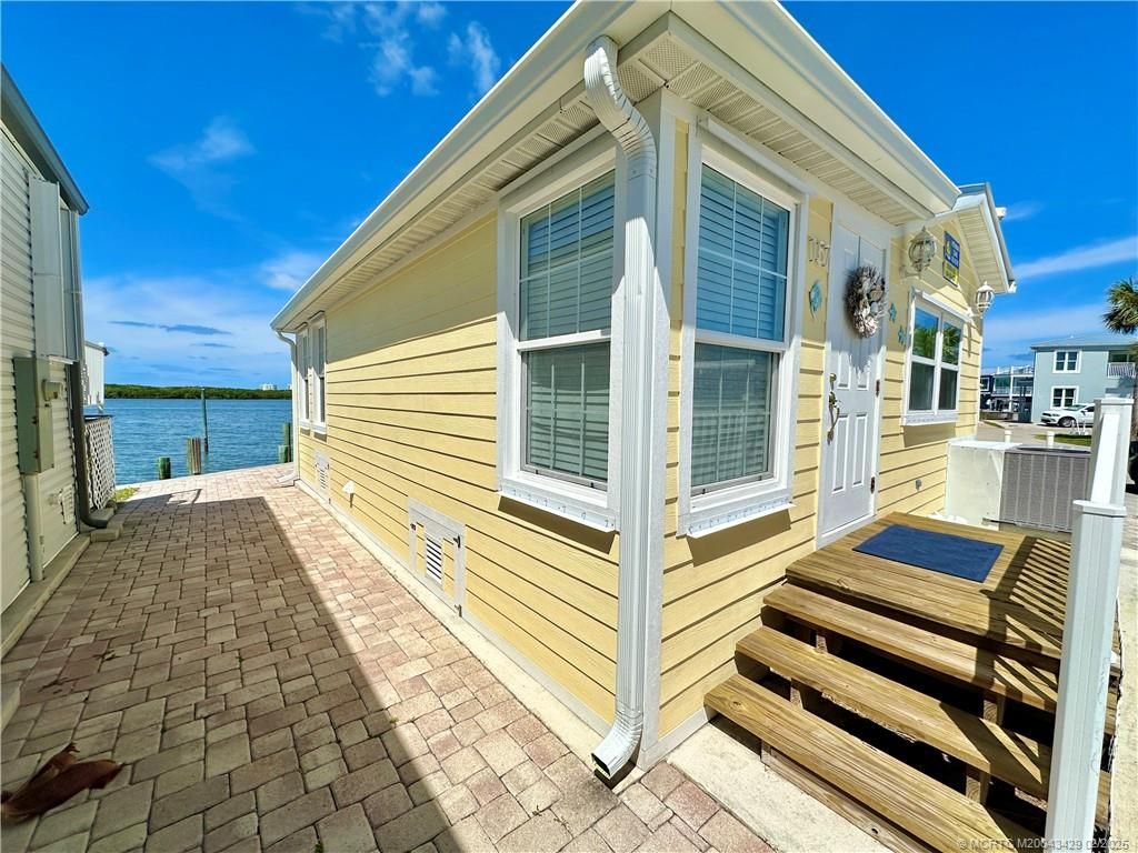 Photo of 157 Nettles Boulevard, Jensen Beach, FL 34957 (MLS # M20043429)