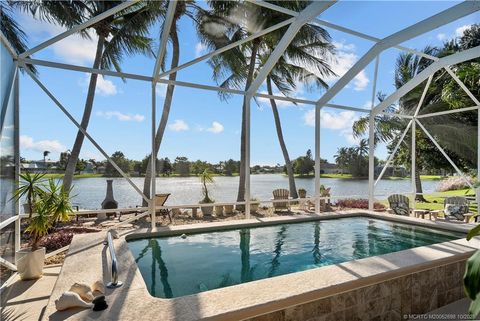 Photo of 869 NW Waterlily Place, Jensen Beach, FL 34957 (MLS # M20052698)