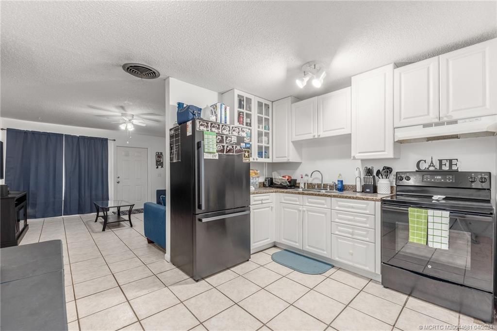Photo of 3059 SE Amherst Street #3059-3069, Stuart, FL 34997 (MLS # M20044681)