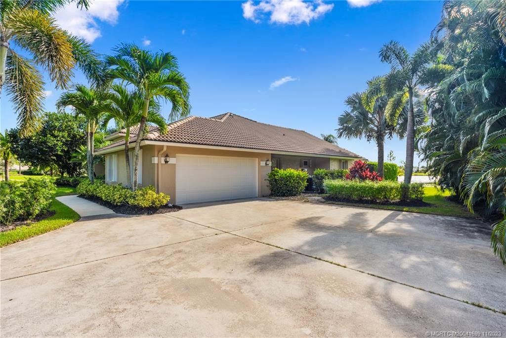 Photo of 4904 SW Lake Grove Circle, Palm City, FL 34990 (MLS # M20041699)