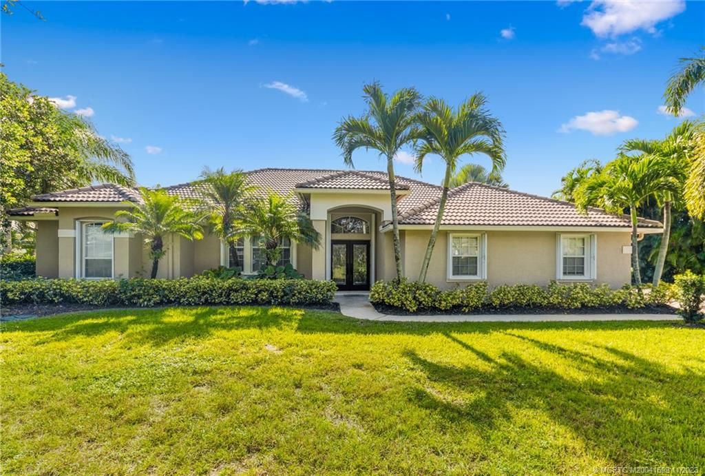 Photo of 4904 SW Lake Grove Circle, Palm City, FL 34990 (MLS # M20041699)