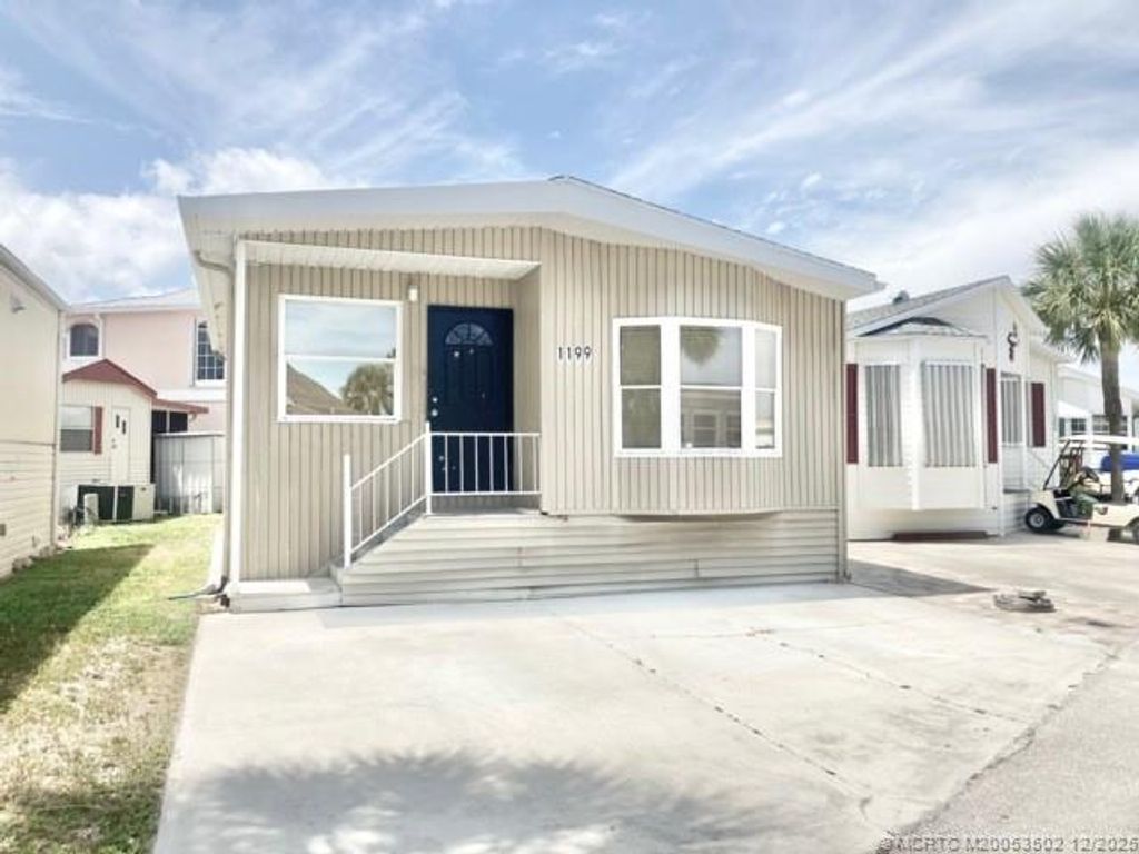 Photo of 1199 Nettles Boulevard, Jensen Beach, FL 34957 (MLS # M20053502)