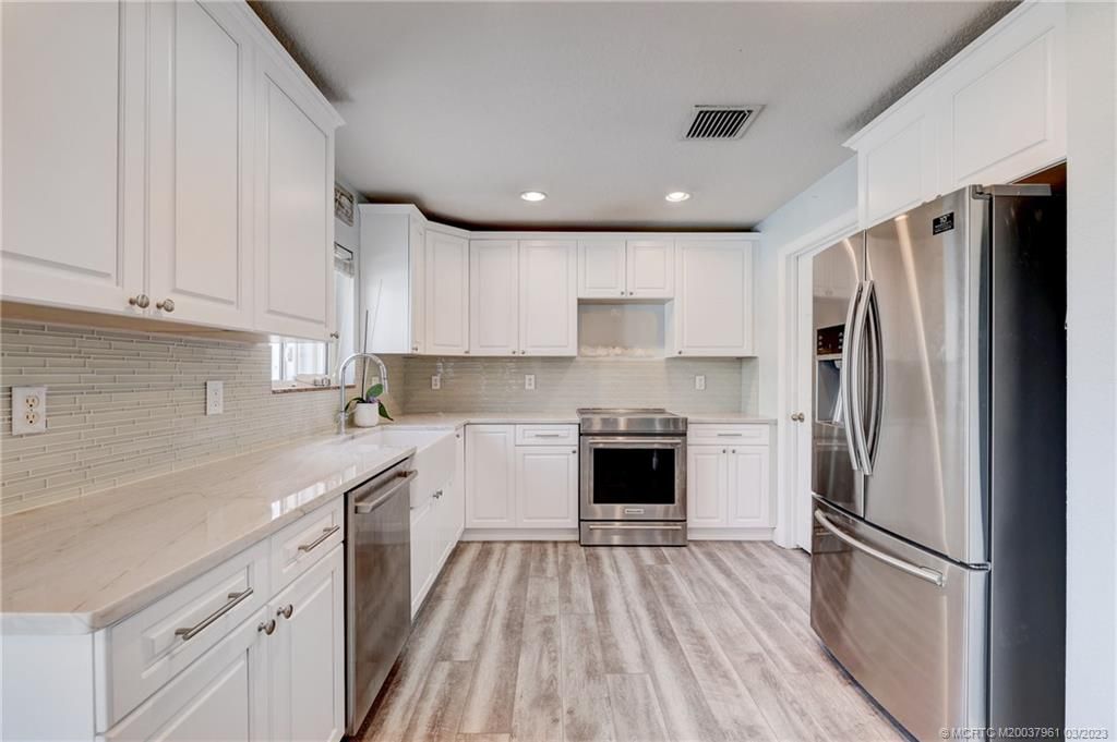 Photo of 5688 SE Graham Drive, Stuart, FL 34997 (MLS # M20037961)