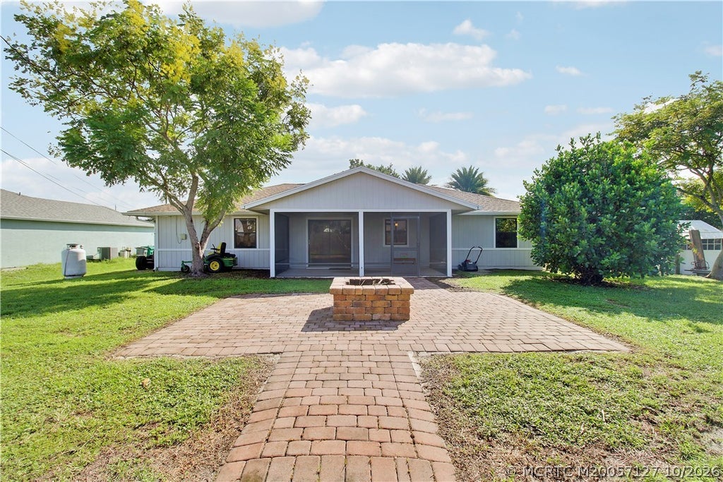 Photo of 4586 SW Calloway Street, Port Saint Lucie, FL 34953 (MLS # M20057127)