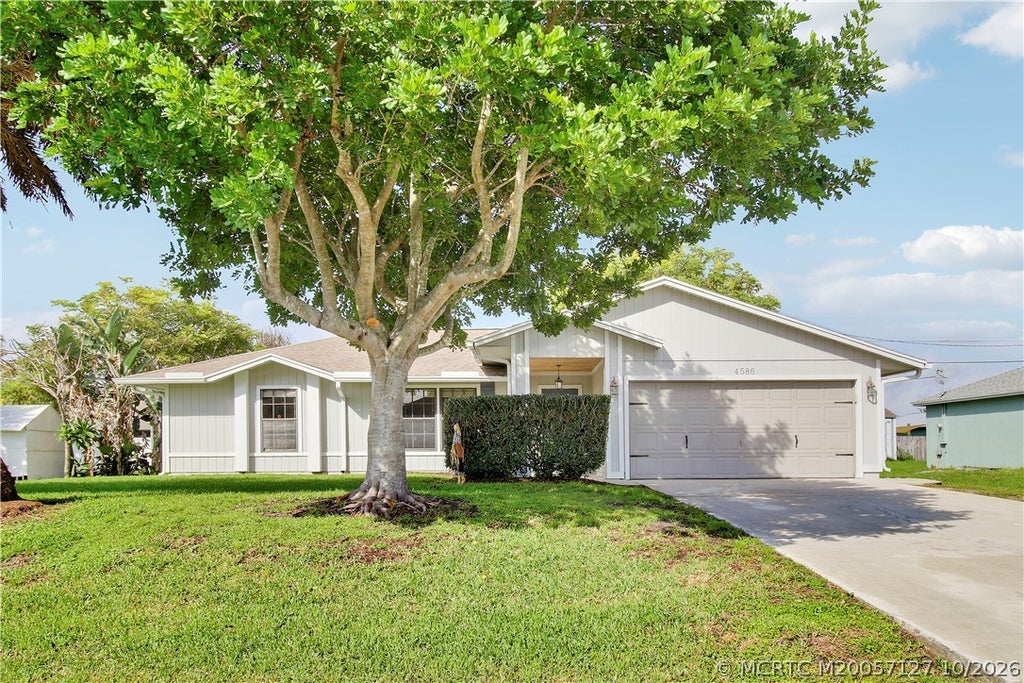 Photo of 4586 SW Calloway Street, Port Saint Lucie, FL 34953 (MLS # M20057127)