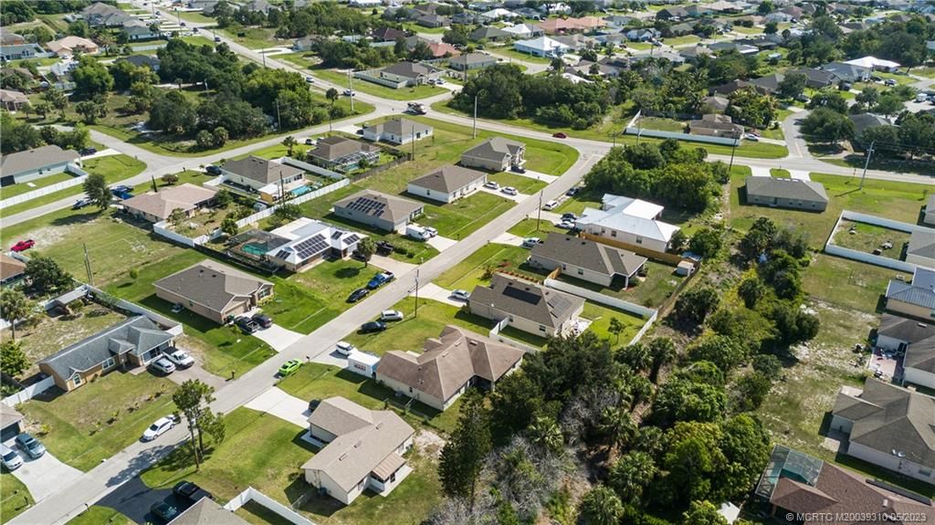 Photo of 942 SW McComkle Avenue, Port Saint Lucie, FL 34953 (MLS # M20039310)