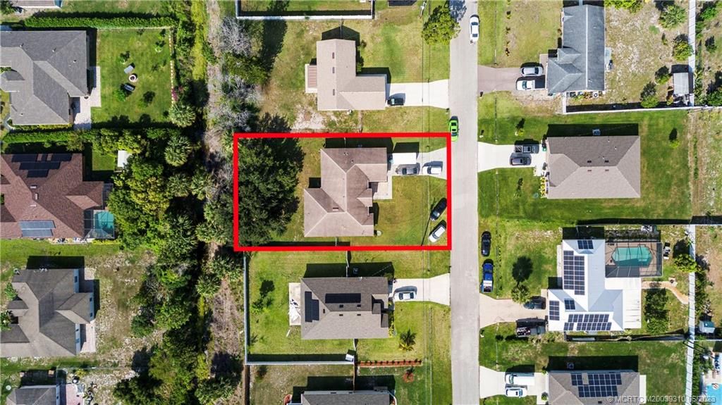 Photo of 942 SW McComkle Avenue, Port Saint Lucie, FL 34953 (MLS # M20039310)