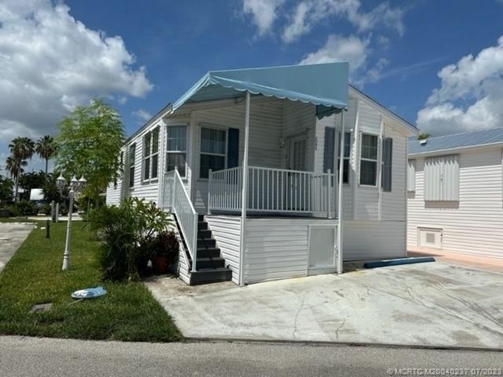 Photo of 646 Nettles Boulevard, Jensen Beach, FL 34957 (MLS # M20040237)