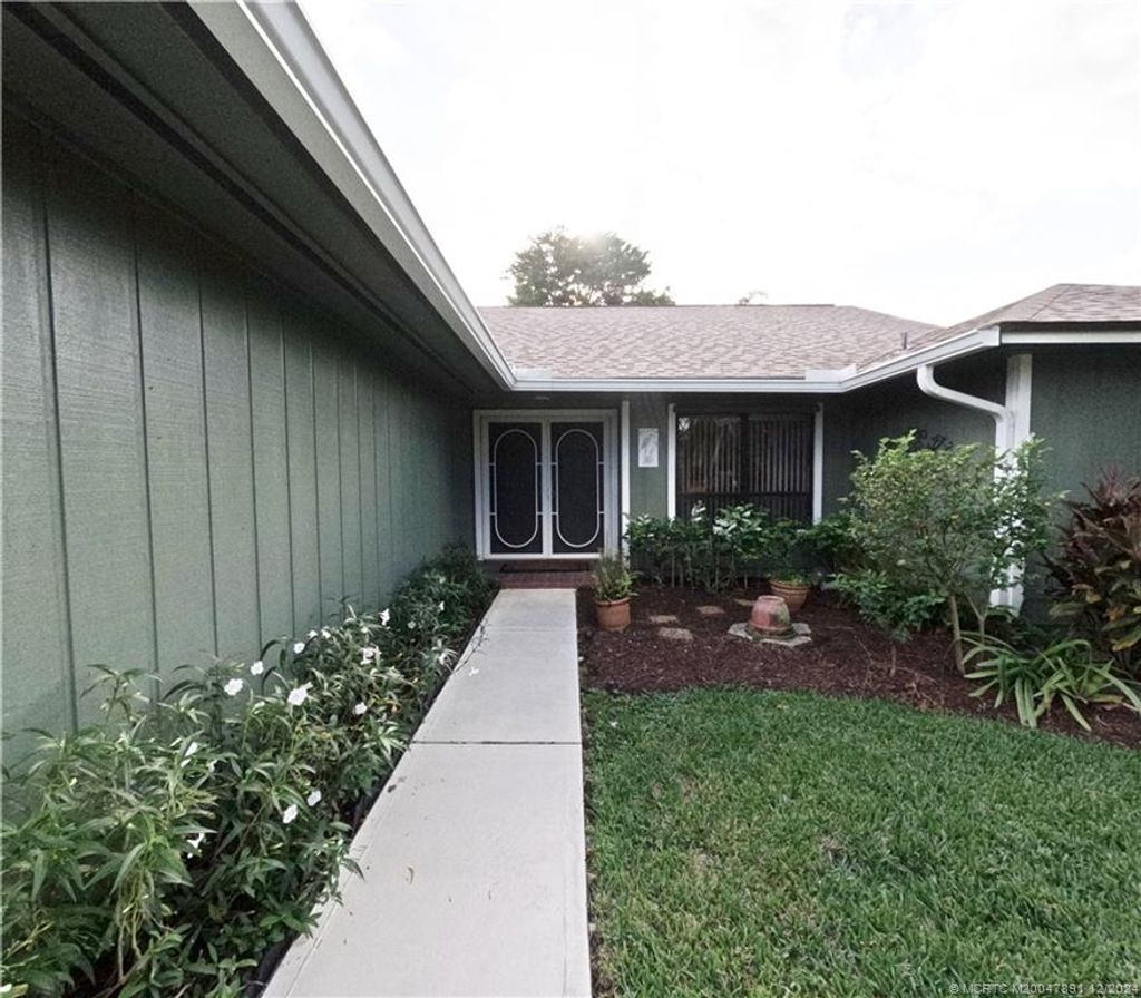 Photo of 7906 SE Trenton Avenue, Hobe Sound, FL 33455 (MLS # M20047891)