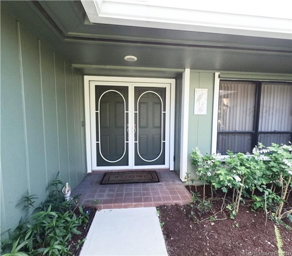 Photo of 7906 SE Trenton Avenue, Hobe Sound, FL 33455 (MLS # M20047891)
