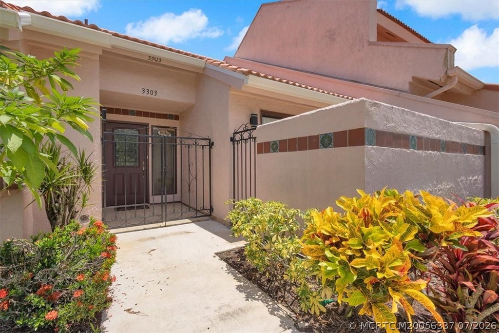 Photo of 3303 SE Sandpiper Circle, Port Saint Lucie, FL 34952 (MLS # M20056337)