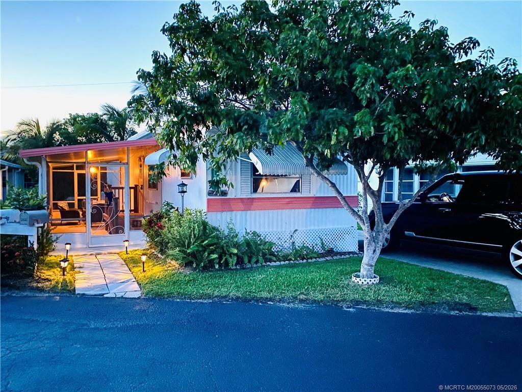 Photo of 4736 NE Blue Heron Lane, Jensen Beach, FL 34957 (MLS # M20055073)