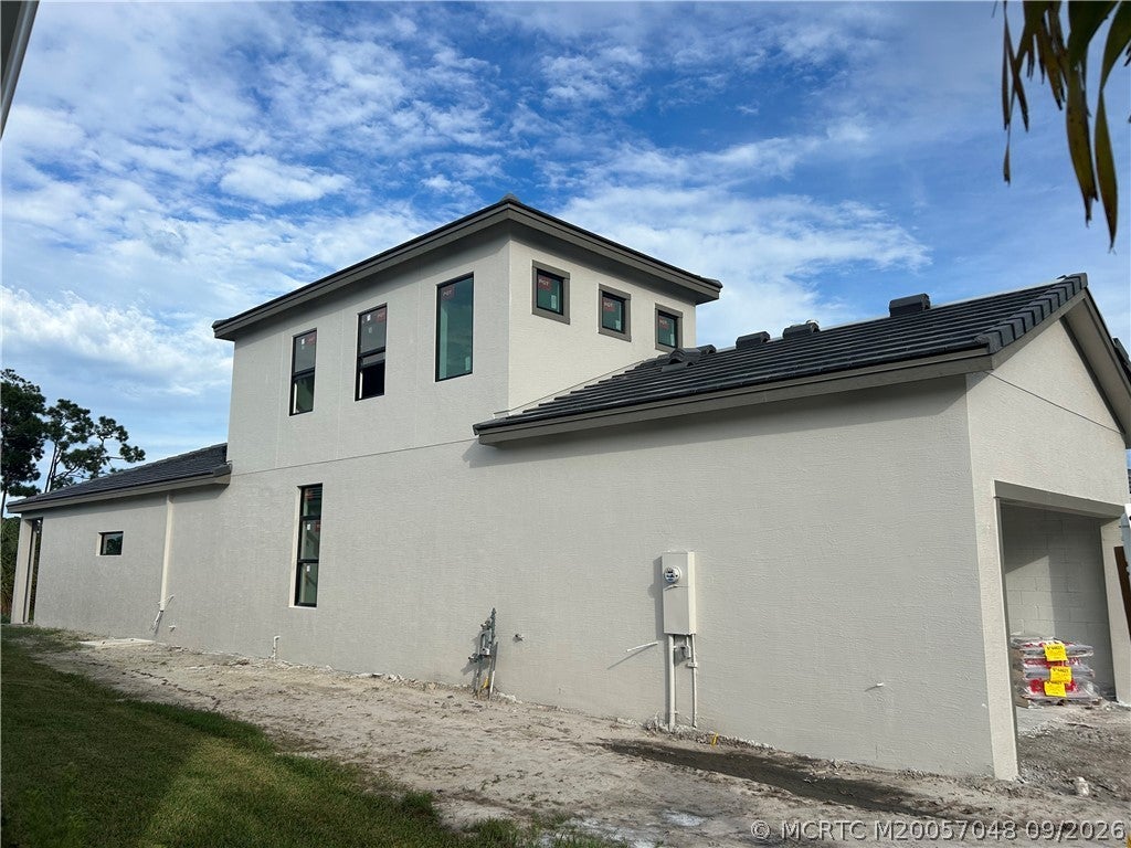 Photo of 431 SE Via Sangro, Port Saint Lucie, FL 34952 (MLS # M20057048)