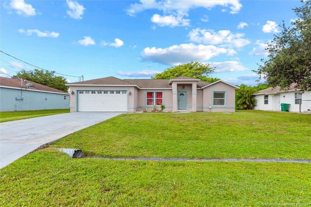 Photo of 2234 SE Friendship Street, Port Saint Lucie, FL 34952 (MLS # M20045981)