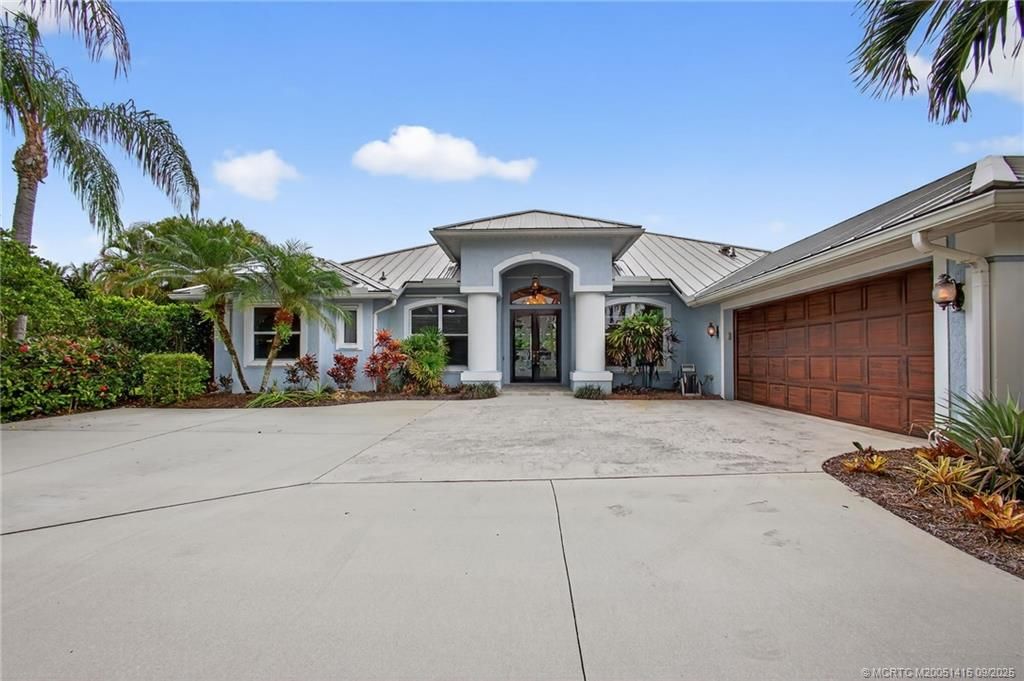 Photo of 4821 SW Lake Grove Circle, Palm City, FL 34990 (MLS # M20051415)