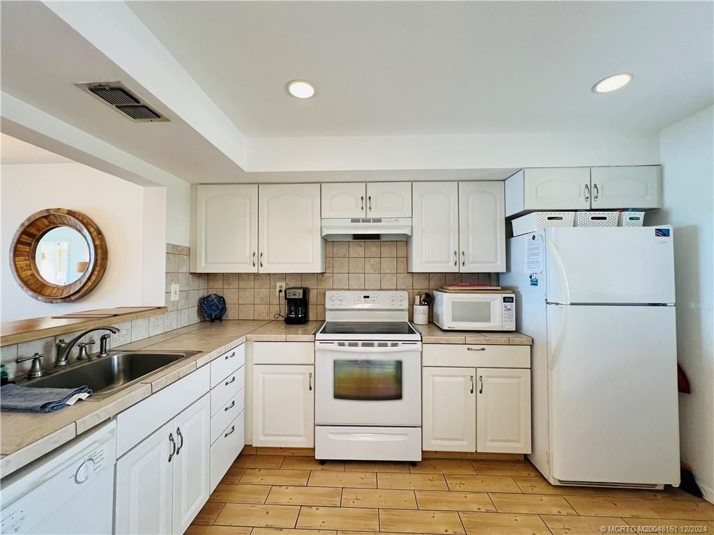 Photo of 9400 S Ocean Drive #202, Jensen Beach, FL 34957 (MLS # M20048151)