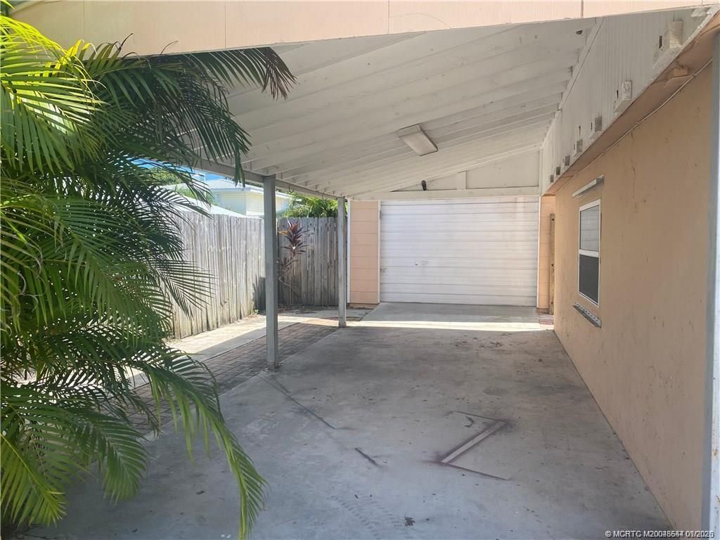 Photo of 2873 NE Spruce Ridge Avenue, Jensen Beach, FL 34957 (MLS # M20048544)