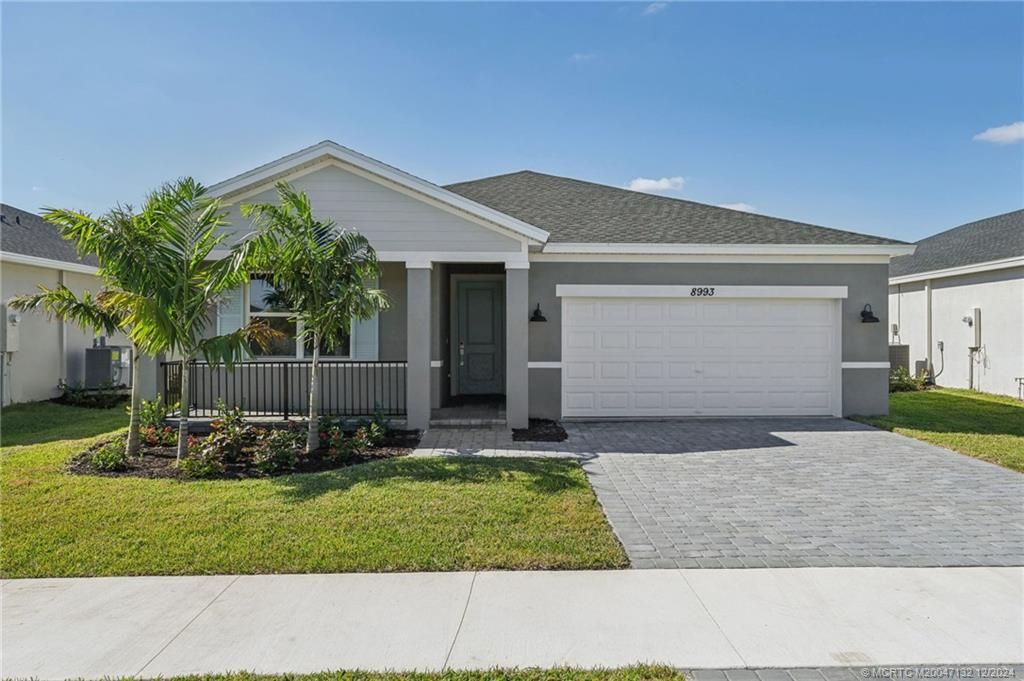 Photo of 8993 Dahlia Circle, Port Saint Lucie, FL 34986 (MLS # M20047132)