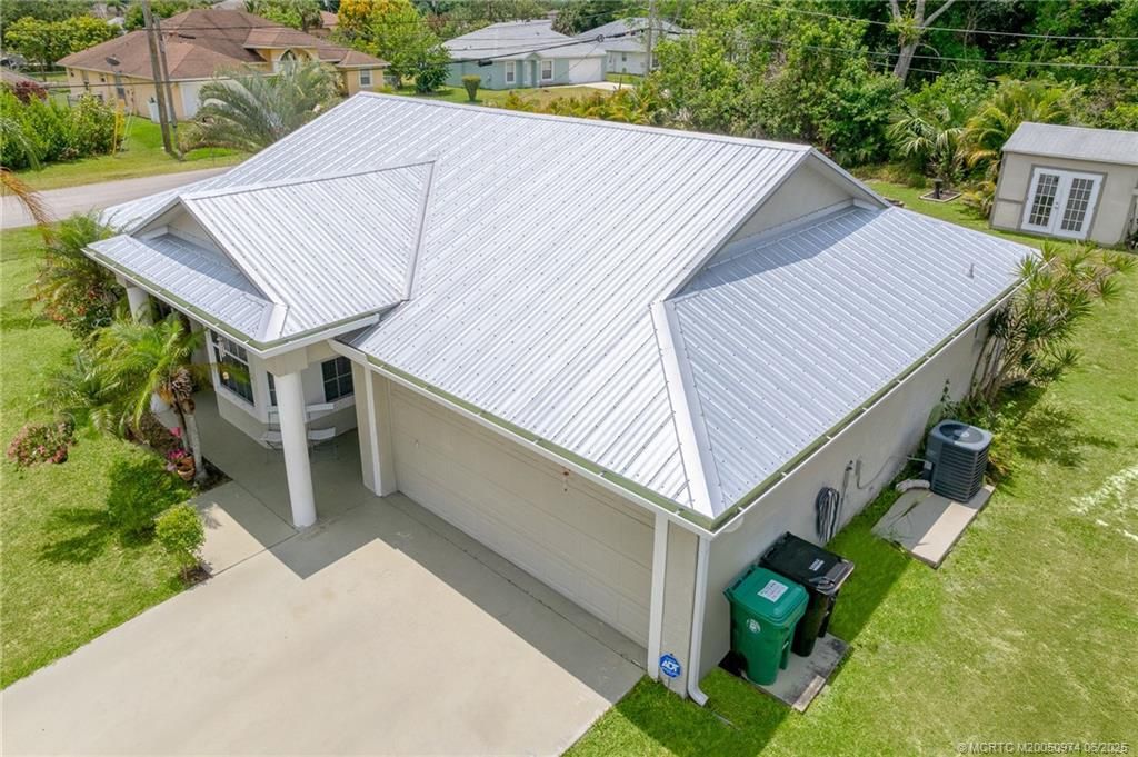 Photo of 3792 SW Hulska Street, Port Saint Lucie, FL 34953 (MLS # M20050974)