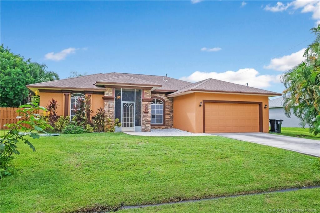 Photo of 3532 SW Margela Street, Port Saint Lucie, FL 34953 (MLS # M20052734)