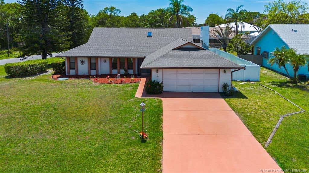Photo of 992 SE Thornhill Drive, Port Saint Lucie, FL 34983 (MLS # M20055141)
