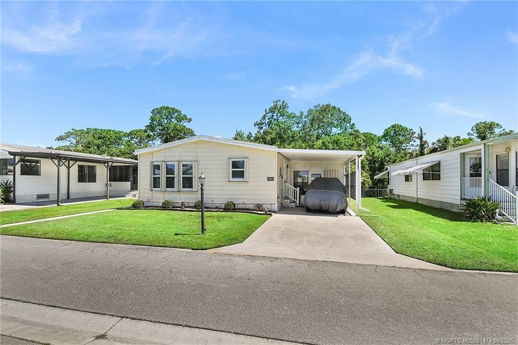 Photo of 8585 Florence Drive, Port Saint Lucie, FL 34952 (MLS # M20051474)