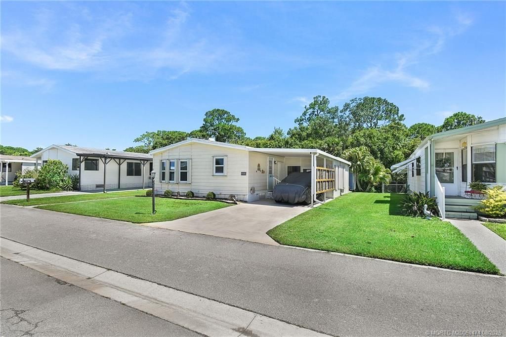 Photo of 8585 Florence Drive, Port Saint Lucie, FL 34952 (MLS # M20051474)