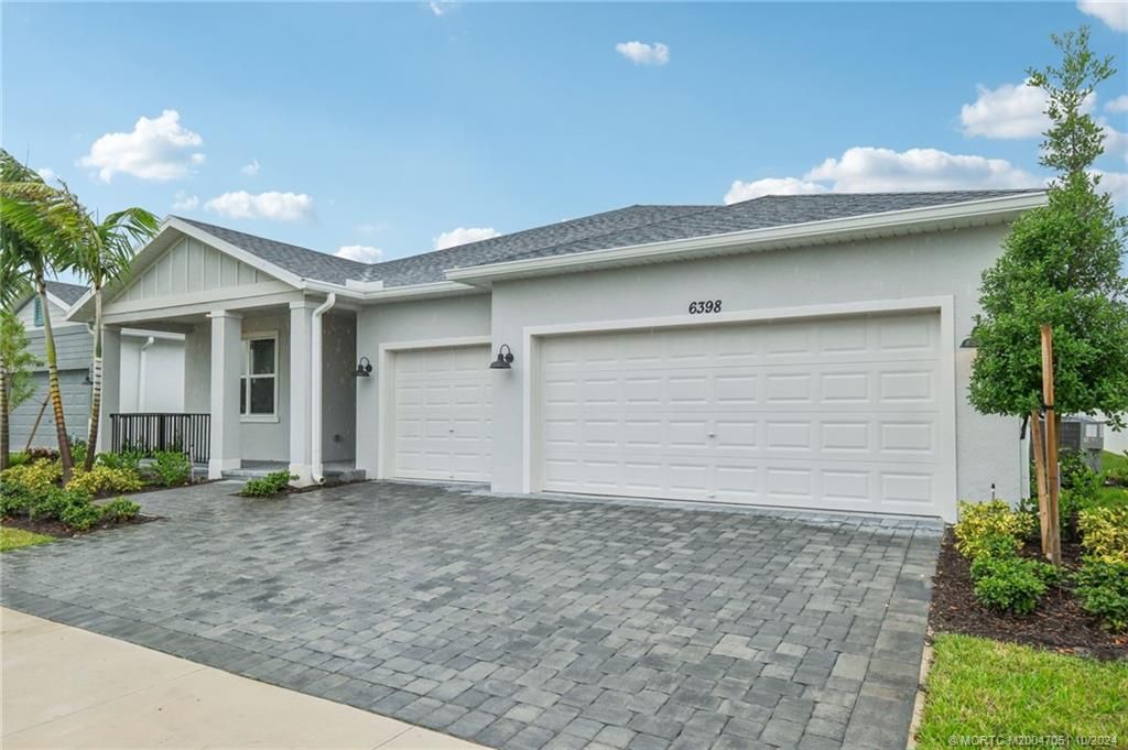 Photo of 6398 NW Sweetwood Drive, Port Saint Lucie, FL 34987 (MLS # M20047051)