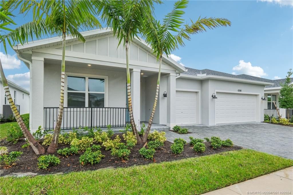 Photo of 6398 NW Sweetwood Drive, Port Saint Lucie, FL 34987 (MLS # M20047051)