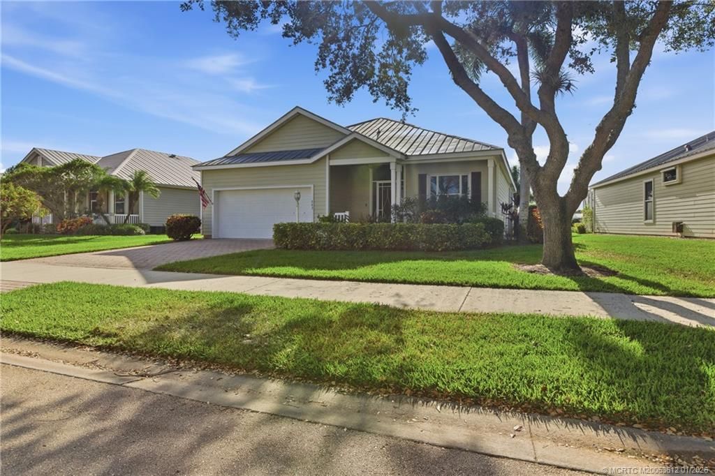 Photo of 543 NE Canoe Park Circle, Port Saint Lucie, FL 34983 (MLS # M20053612)