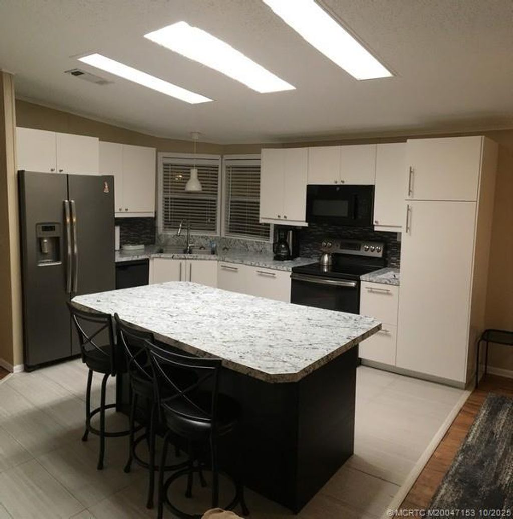 Photo of 14514 SW Rake Drive SW, Indiantown, FL 34956 (MLS # M20047153)