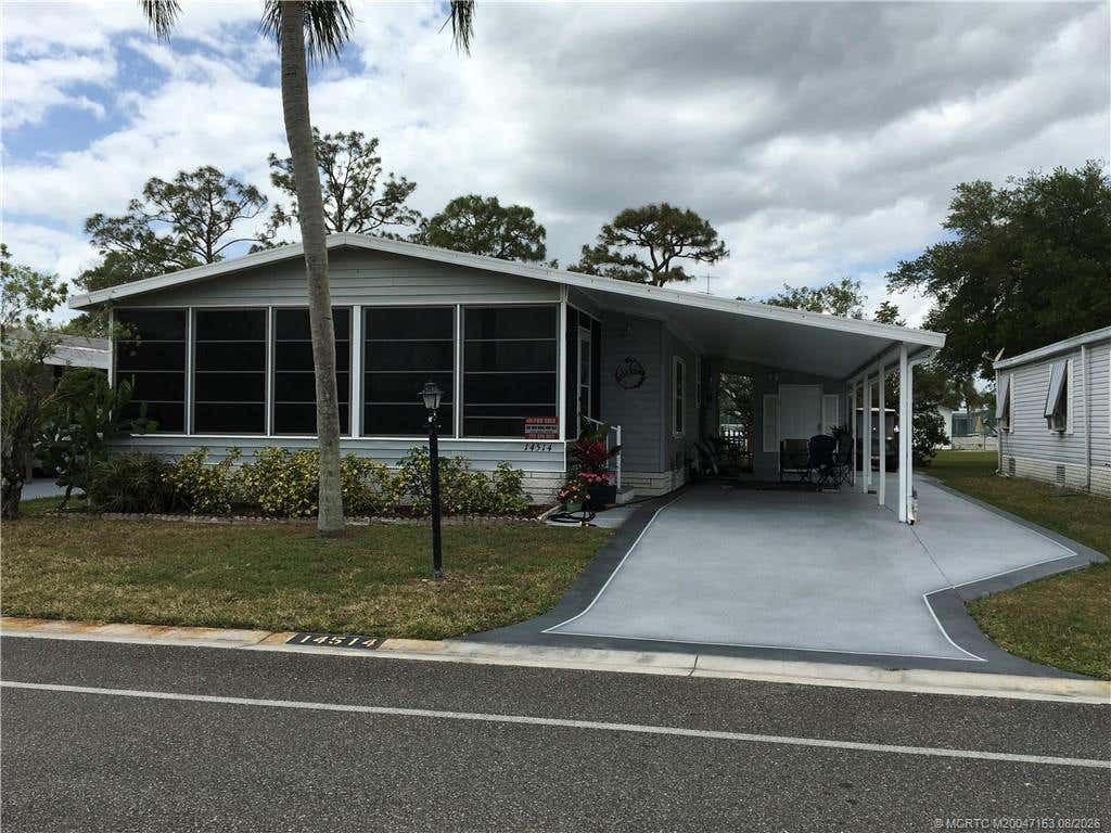 Photo of 14514 SW Rake Drive SW, Indiantown, FL 34956 (MLS # M20047153)