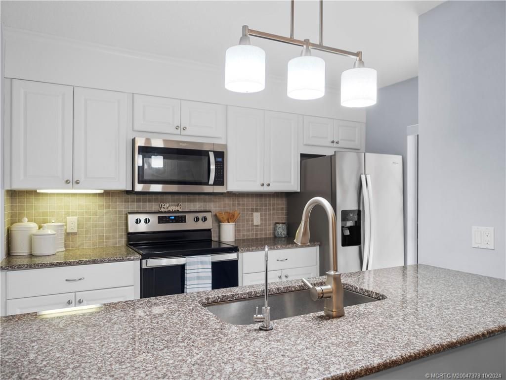 Photo of 3006 SW Sunset Trace Circle, Palm City, FL 34990 (MLS # M20047378)