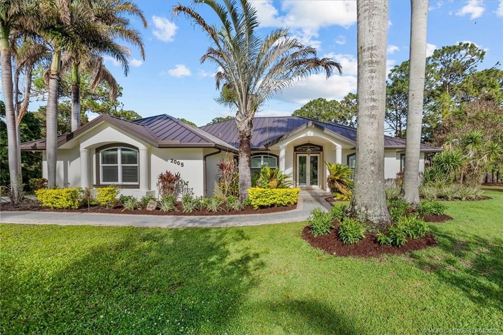 Photo of 2005 SW Amarillo Lane, Palm City, FL 34990 (MLS # M20055125)