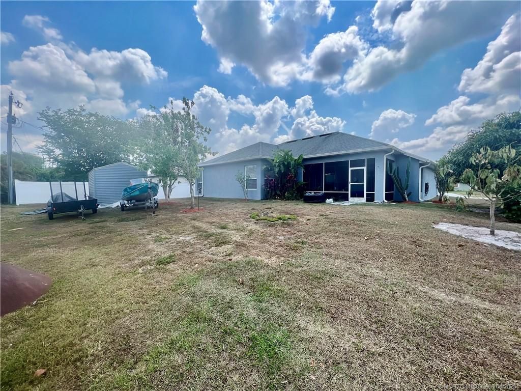 Photo of 199 SW Exmore Avenue, Port Saint Lucie, FL 34983 (MLS # M20039003)