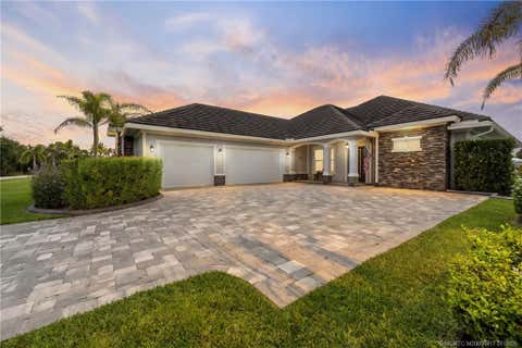 Photo of 1100 SW Squire Johns Lane, Palm City, FL 34990 (MLS # M20056417)