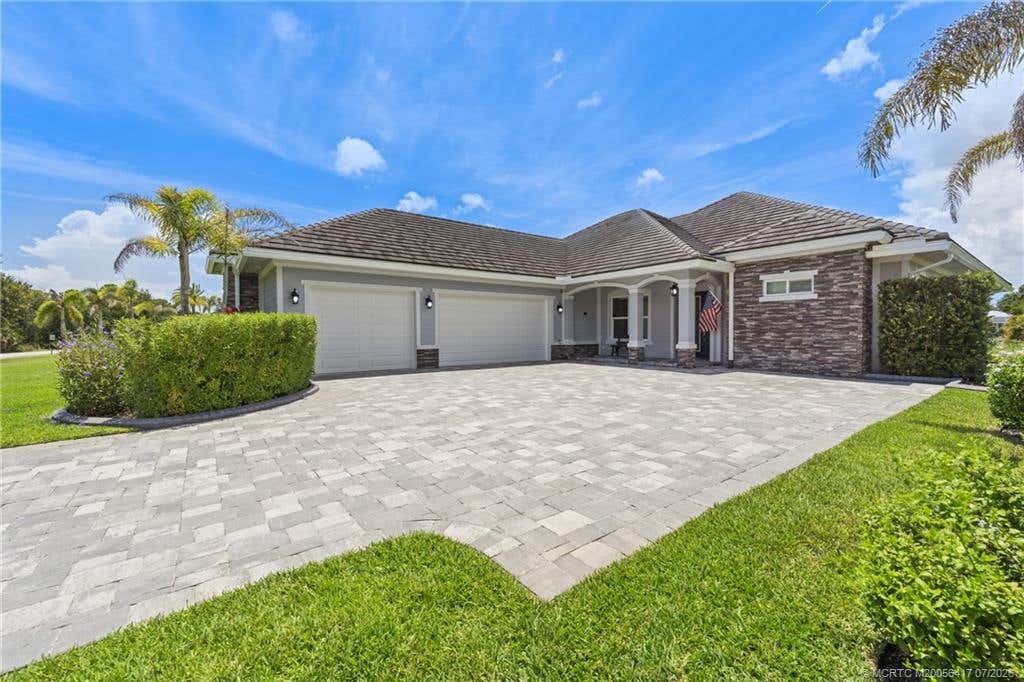 Photo of 1100 SW Squire Johns Lane, Palm City, FL 34990 (MLS # M20056417)
