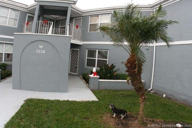 Photo of 3236 SE Aster Lane #M126, Stuart, FL 34994 (MLS # M20056686)