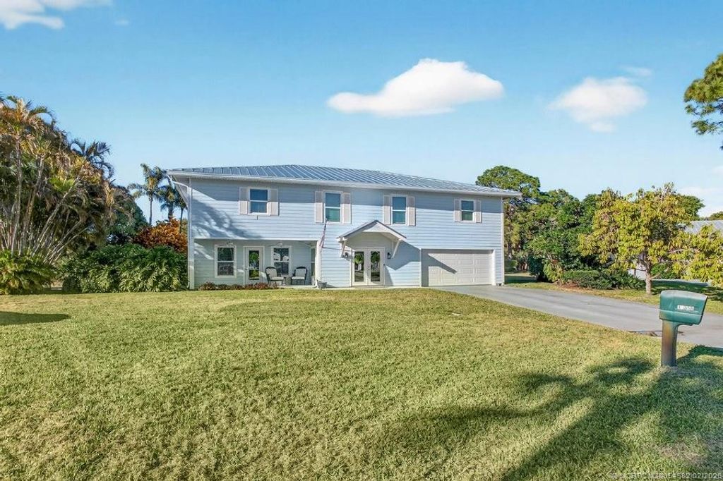 Photo of 10355 Seagrape Way, Palm Beach Gardens, FL 33418 (MLS # M20054582)