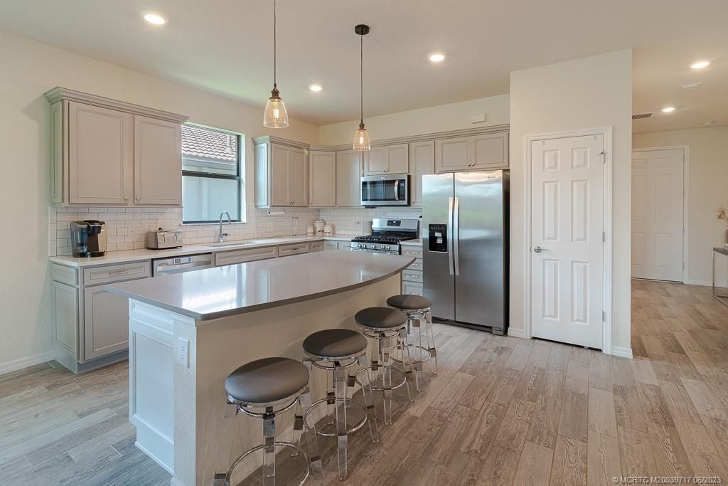 Photo of 375 SE Courances Drive, Port Saint Lucie, FL 34984 (MLS # M20039717)