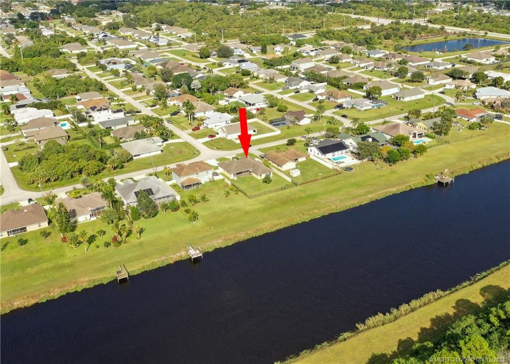 Photo of 898 SW Abbot Avenue, Port Saint Lucie, FL 34953 (MLS # M20042184)