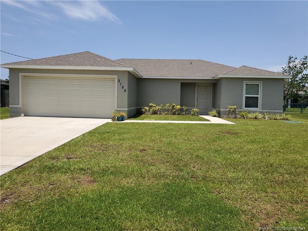 Photo of 3150 SW CENTAMINO Street, Port Saint Lucie, FL 34953 (MLS # M20039935)