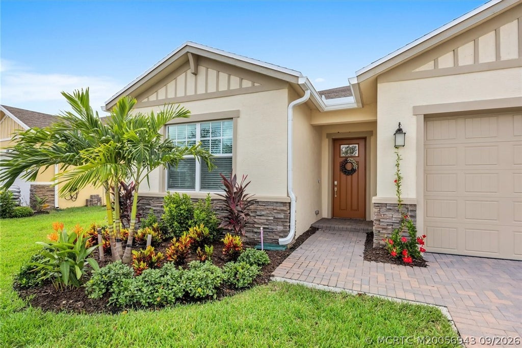 Photo of 1120 SE Crosswood Way, Port Saint Lucie, FL 34984 (MLS # M20056943)