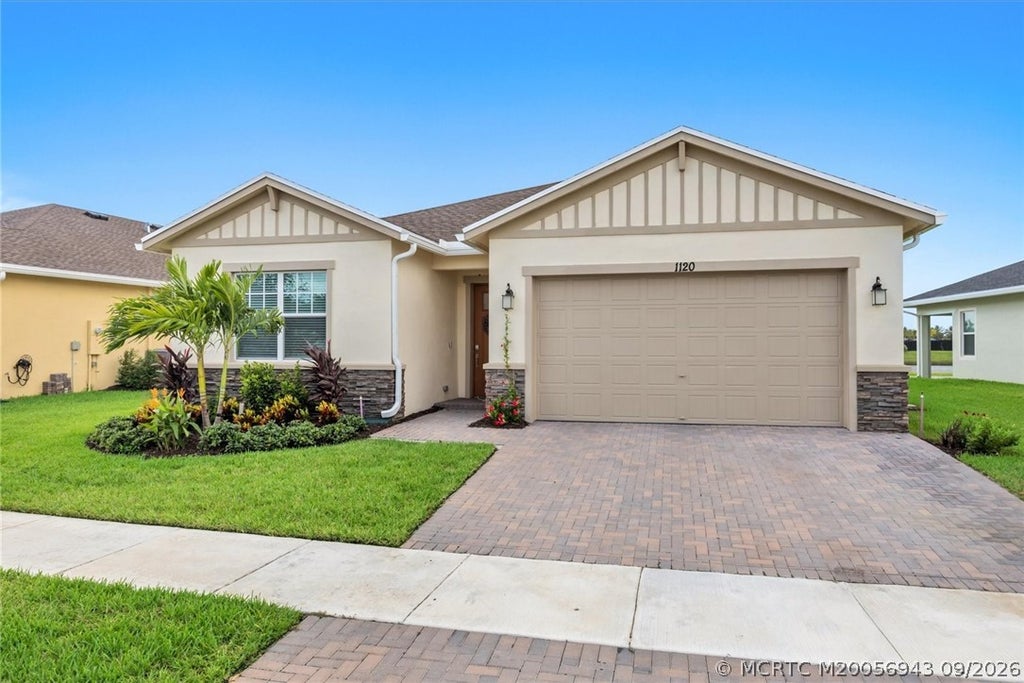 Photo of 1120 SE Crosswood Way, Port Saint Lucie, FL 34984 (MLS # M20056943)