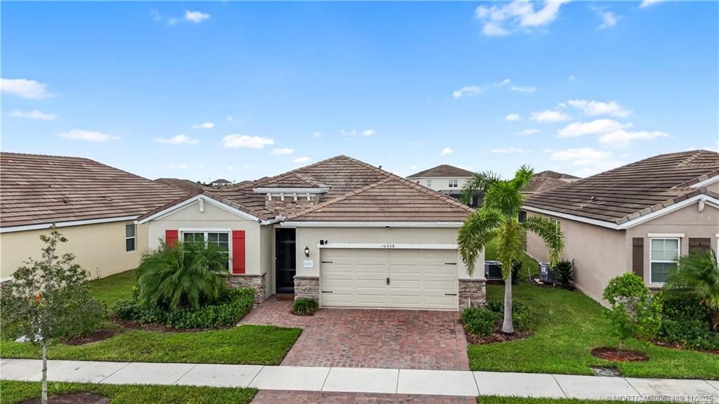 Photo of 10558 SW Toren Way, Port Saint Lucie, FL 34987 (MLS # M20052489)