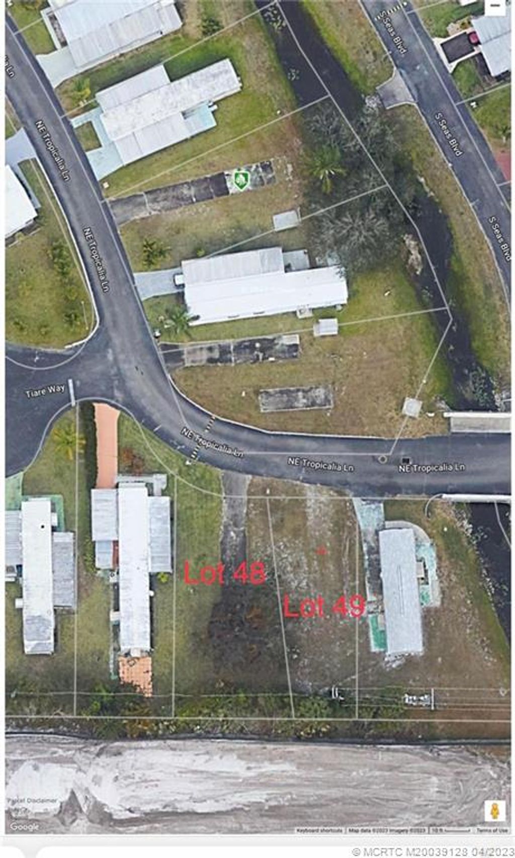 Photo of 333 NE Tropicalia Lane, Jensen Beach, FL 34957 (MLS # M20039128)