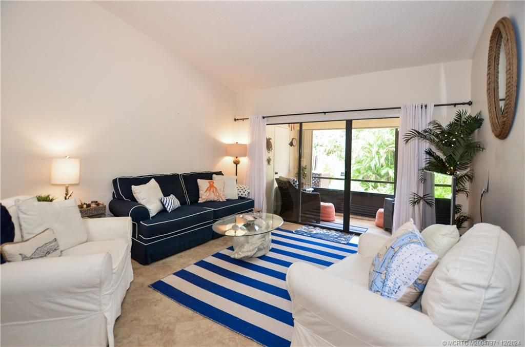 Photo of 1484 SW Silver Pine Way #102F, Palm City, FL 34990 (MLS # M20047971)