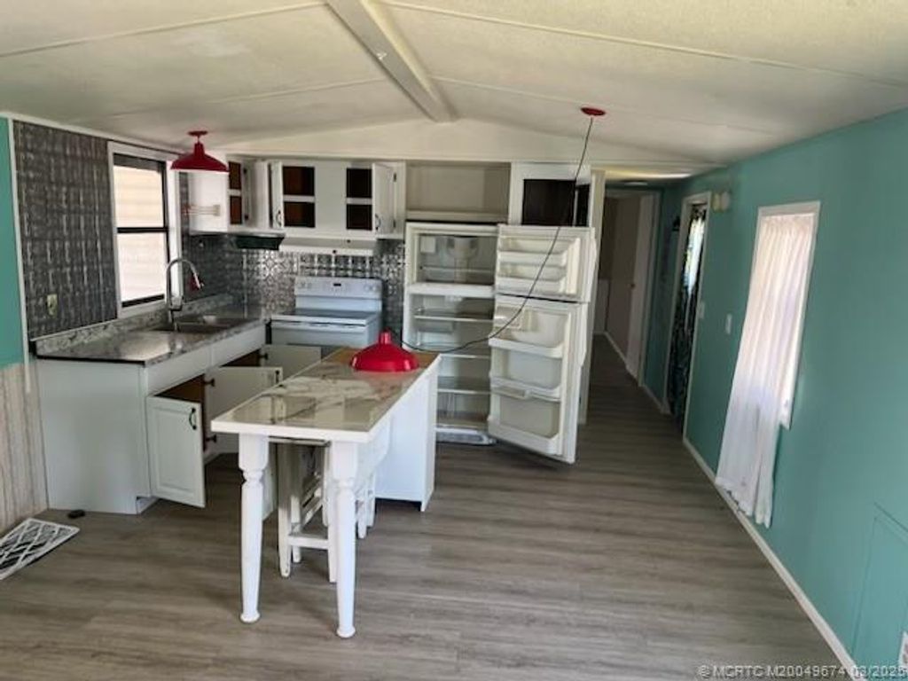 Photo of 4131 70th Lane #1051, West Palm Beach, FL 33404 (MLS # M20049674)