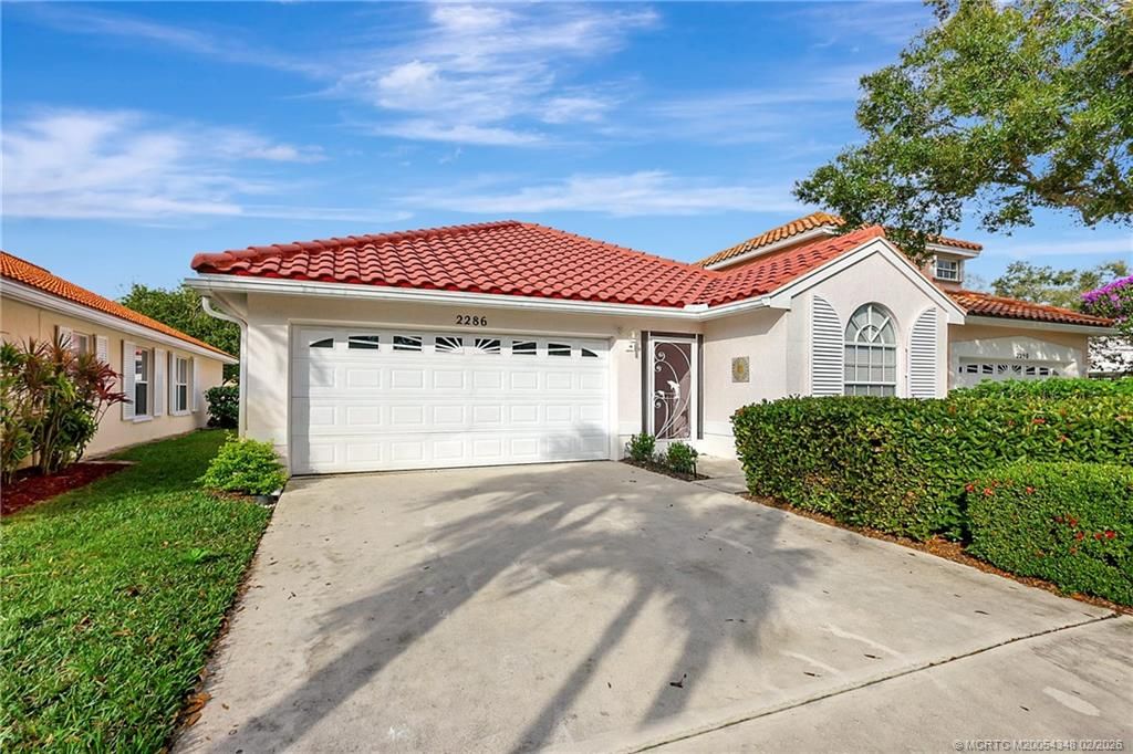 Photo of 2286 SW Olympic Club Terrace, Palm City, FL 34990 (MLS # M20054348)