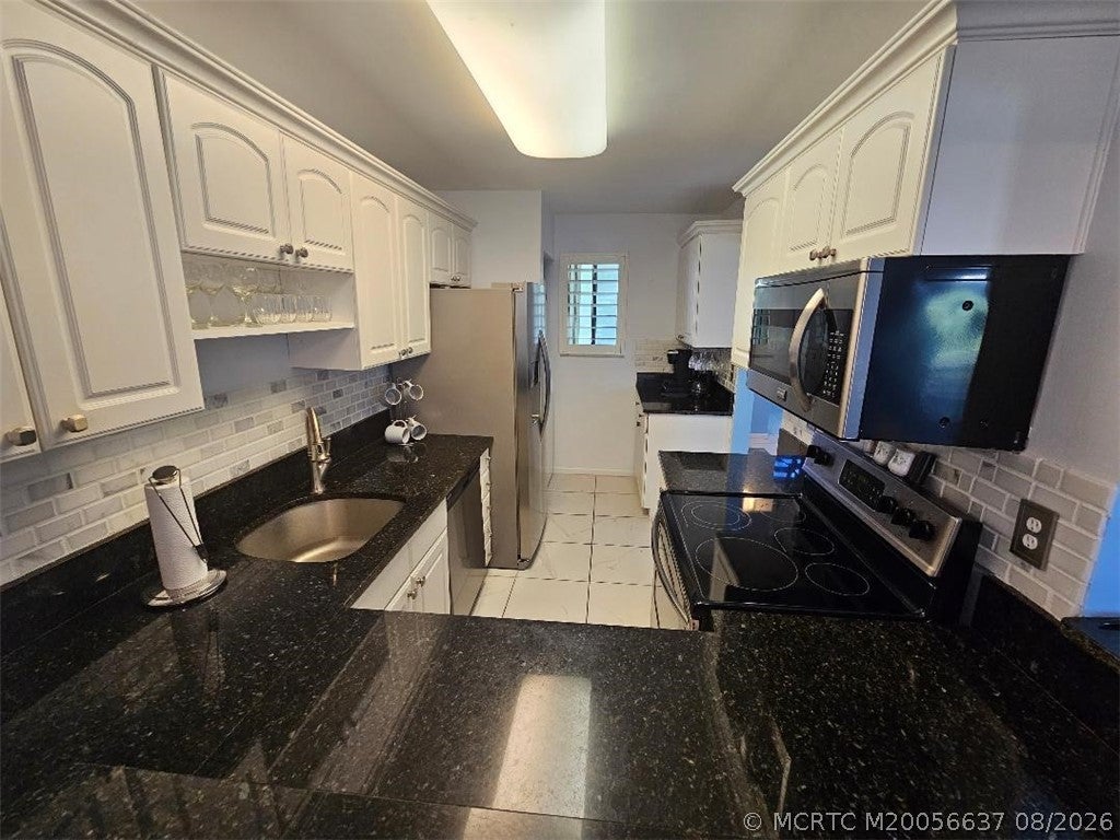 Photo of 5433 SE Miles Grant Road #205, Stuart, FL 34997 (MLS # M20056637)